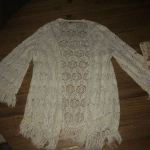 Cream colored Billabong lace/fringe   cardigan.
